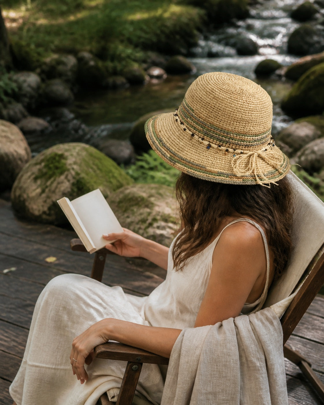 Woman wearing camel linen French beret, side view