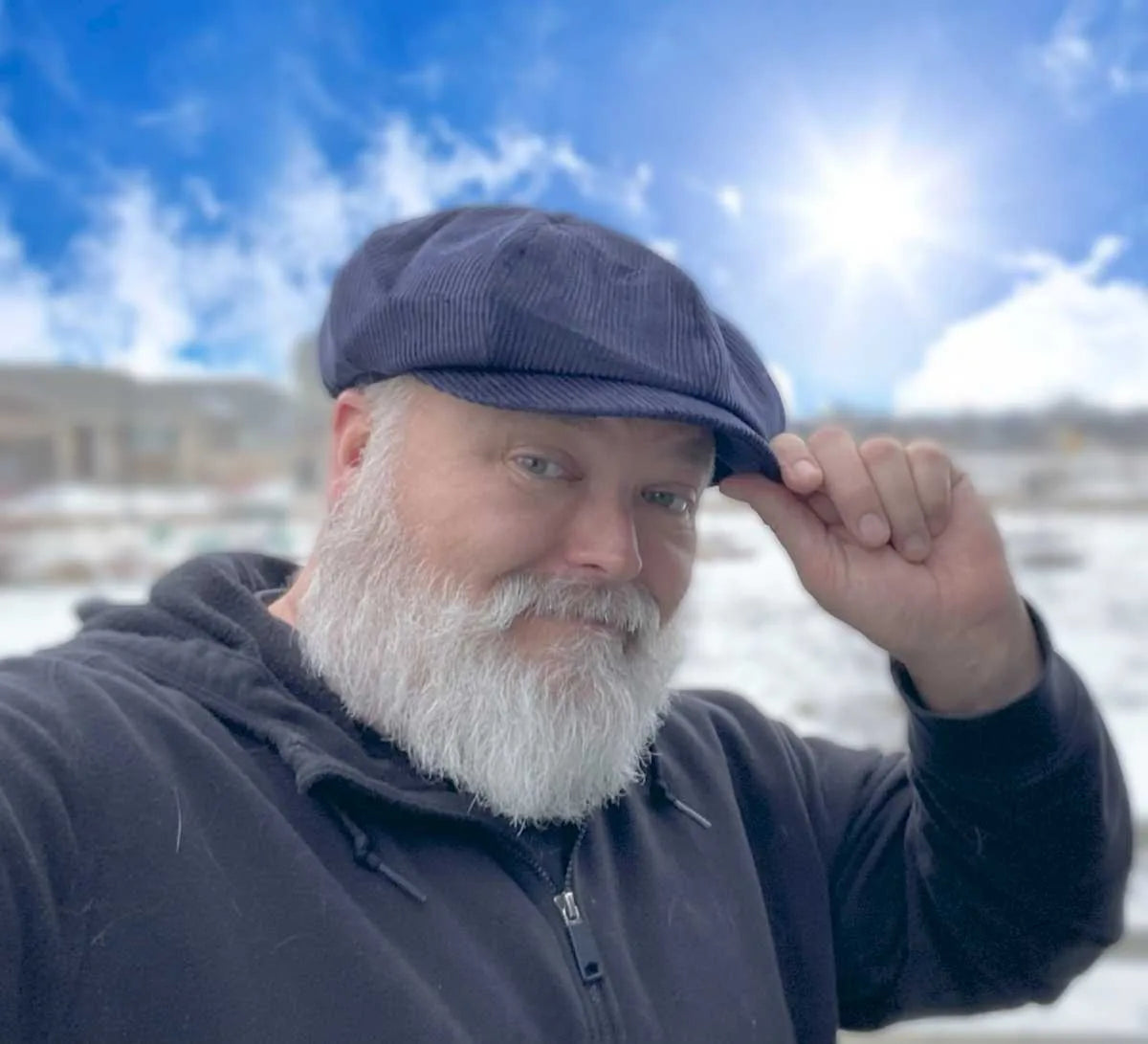 Timothy wearing his blue velvet newsboy cap