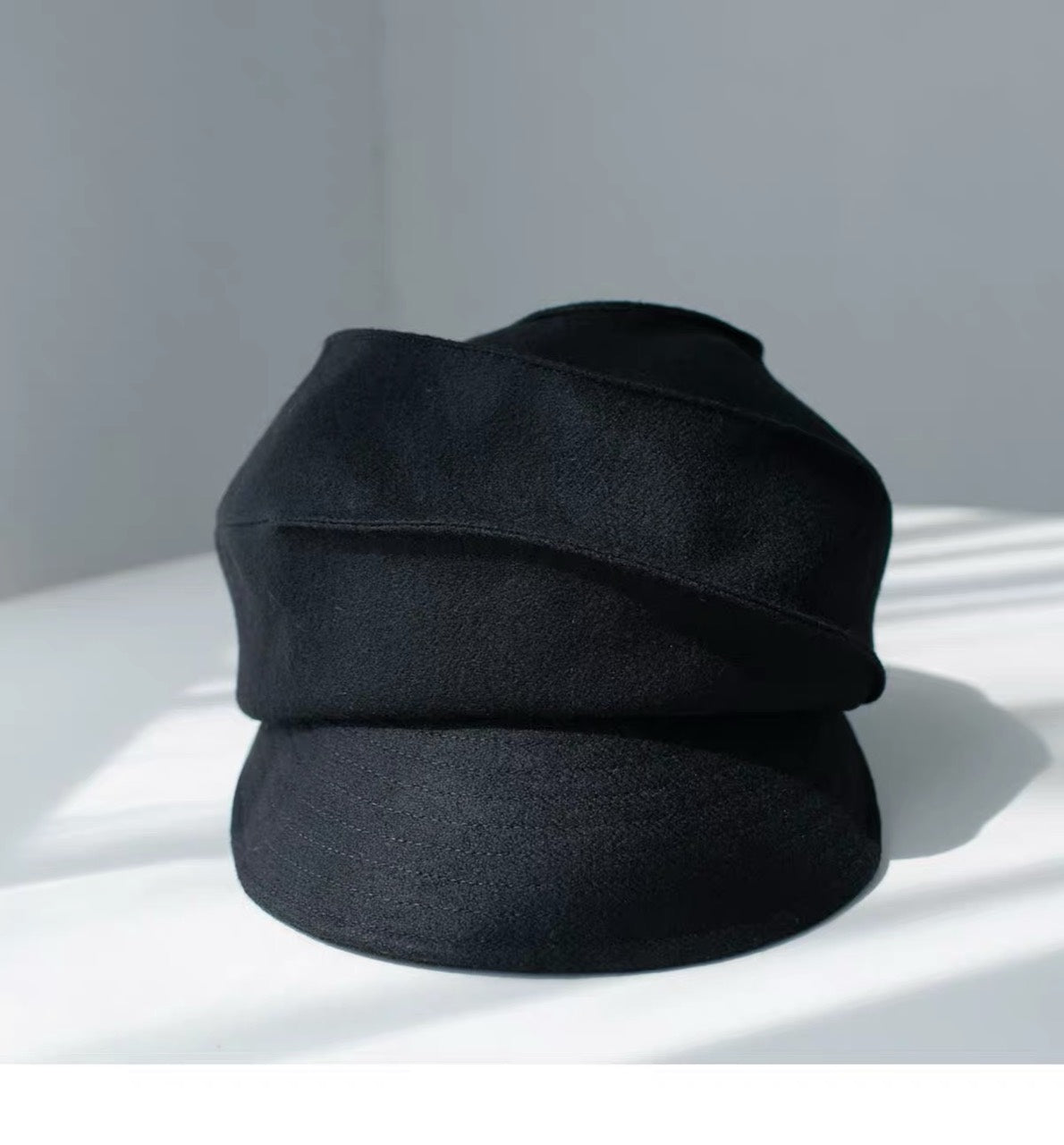 Black sculpted wool newsboy cap, front product view