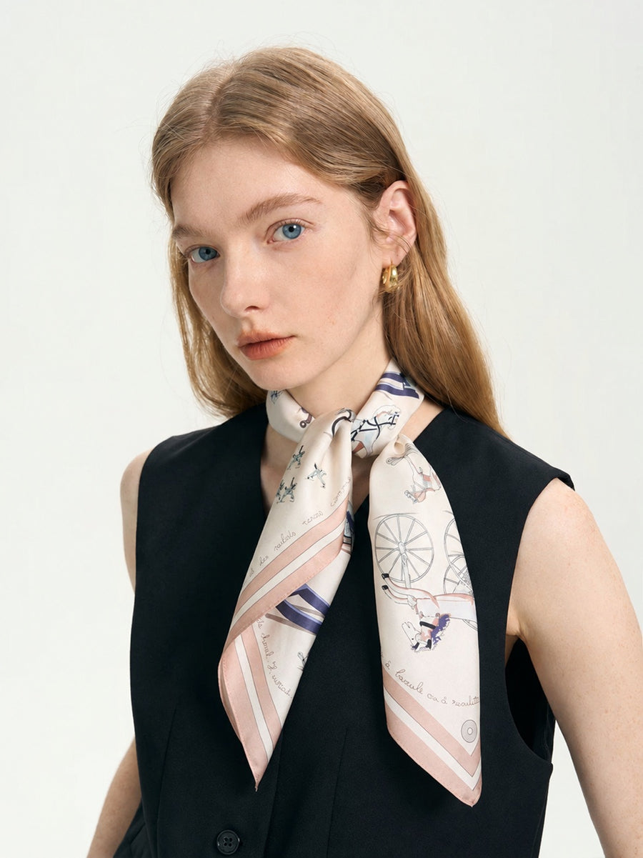 Model wearing a 68cm mulberry silk pony print scarf tied at the neck