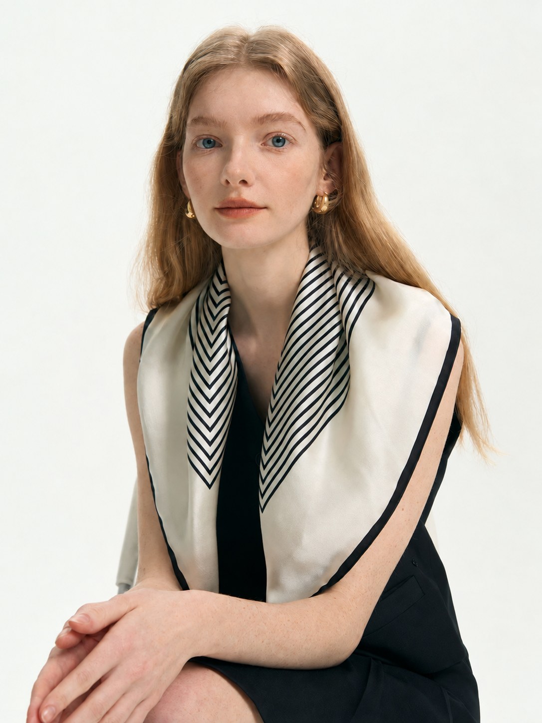Simple Stripe 65cm mulberry silk square scarf worn open over the shoulders, front view