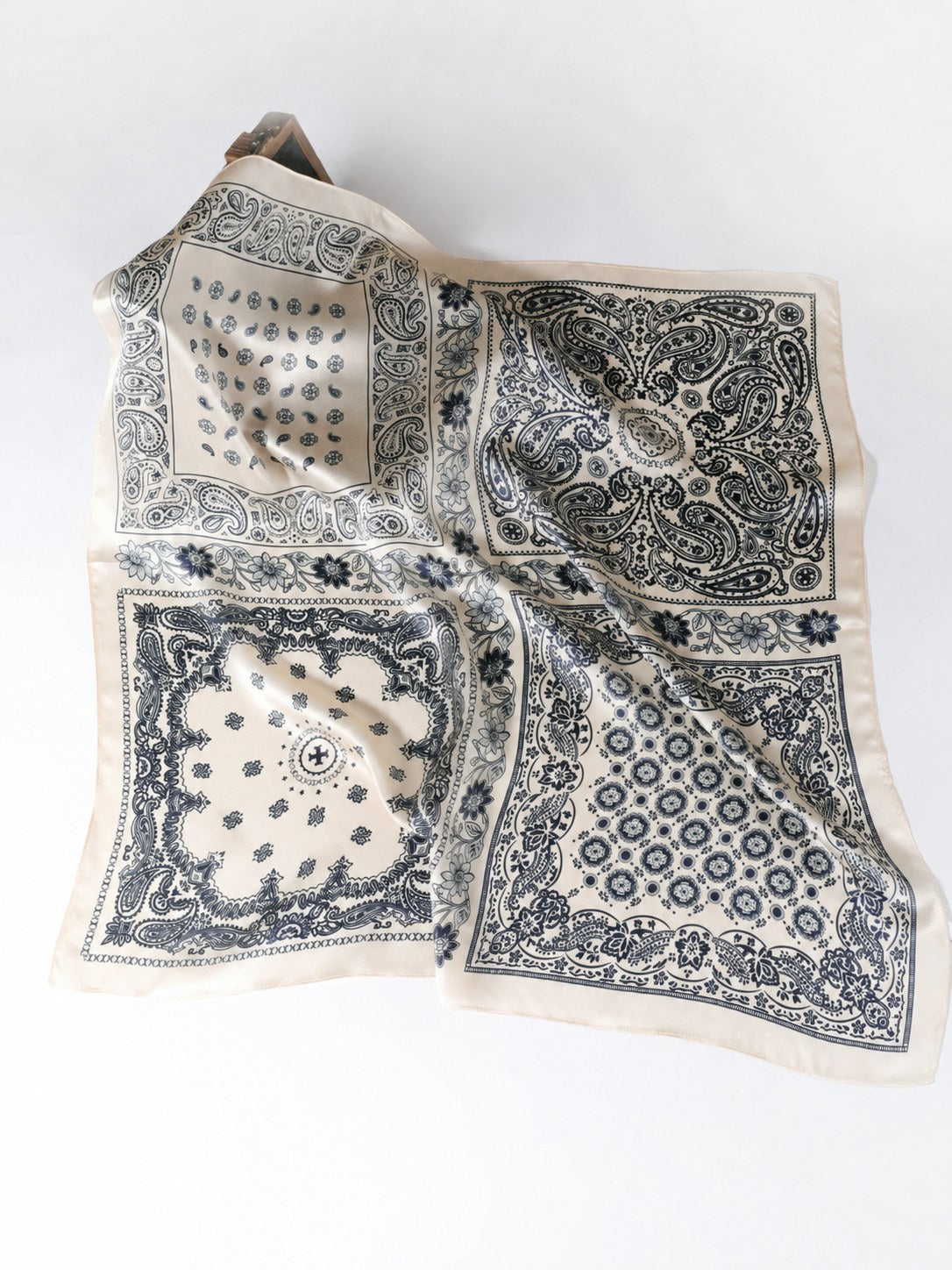 Champagne Paisley 65cm mulberry silk square scarf laid flat to show four paisley panels