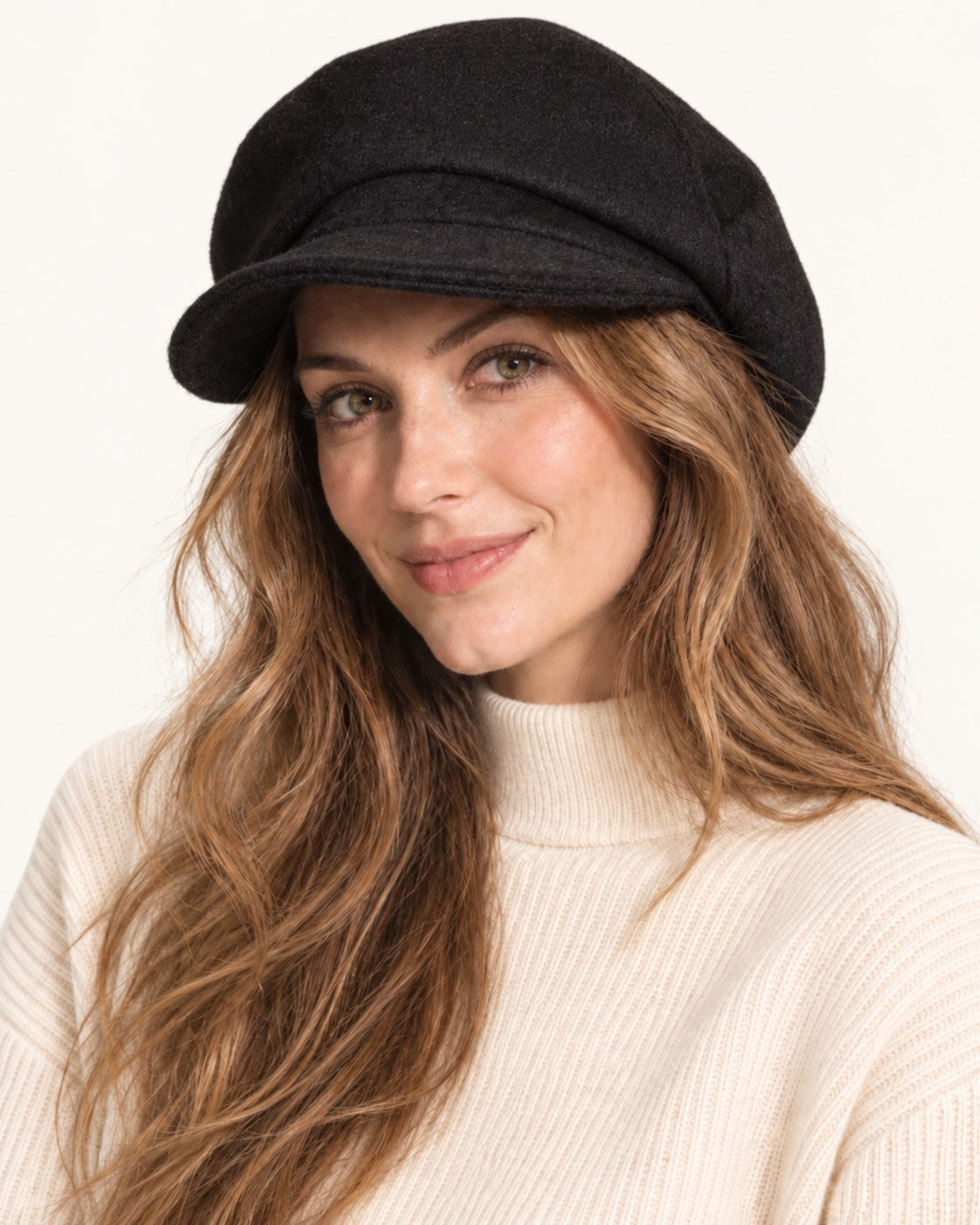Black 100% wool 5-way cap worn by a smiling model, front view