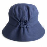 Navy cotton sun hat, back view with elastic gather