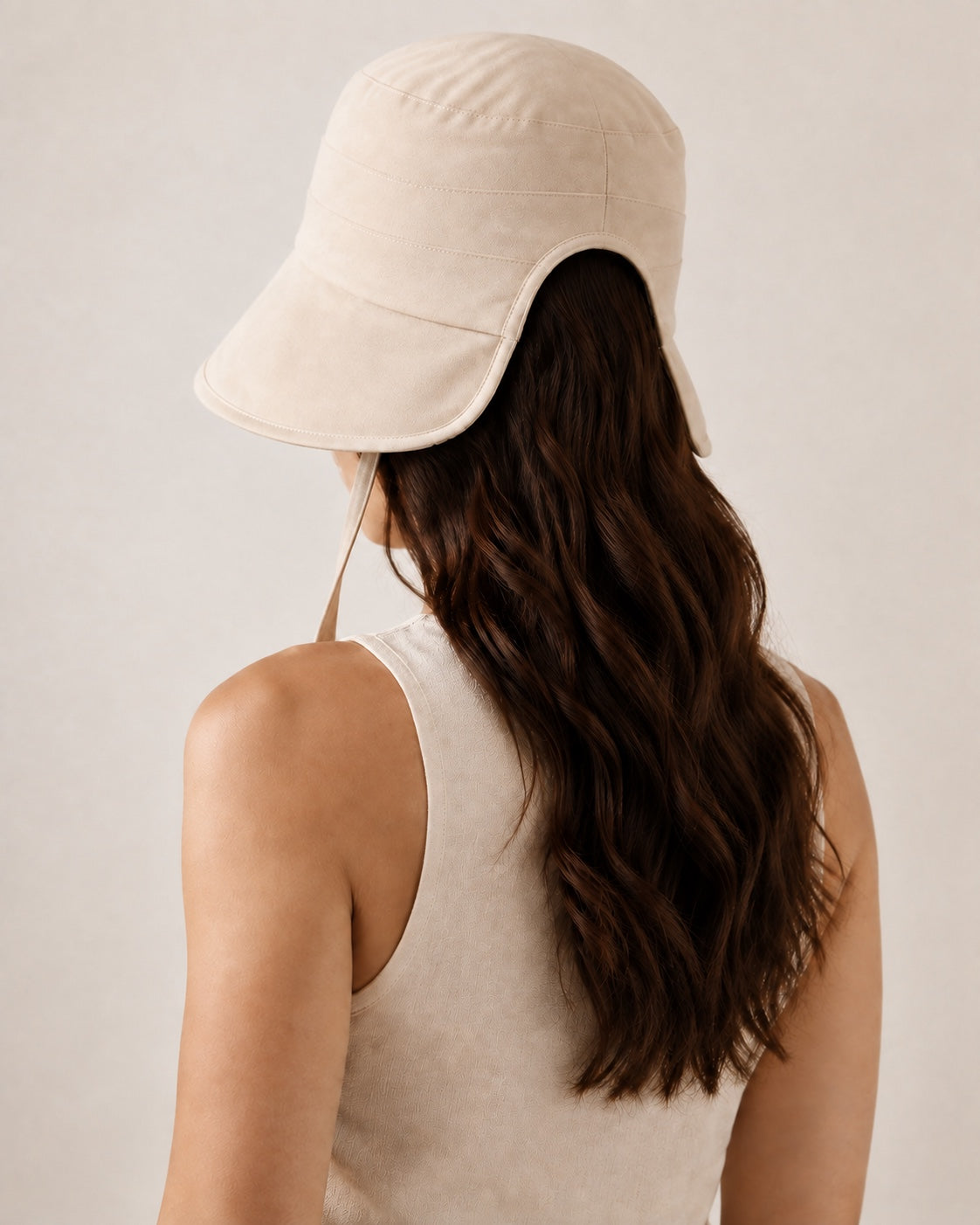 Full back view of beige bucket hat