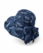 Navy feather-print bucket hat angled, bow detail