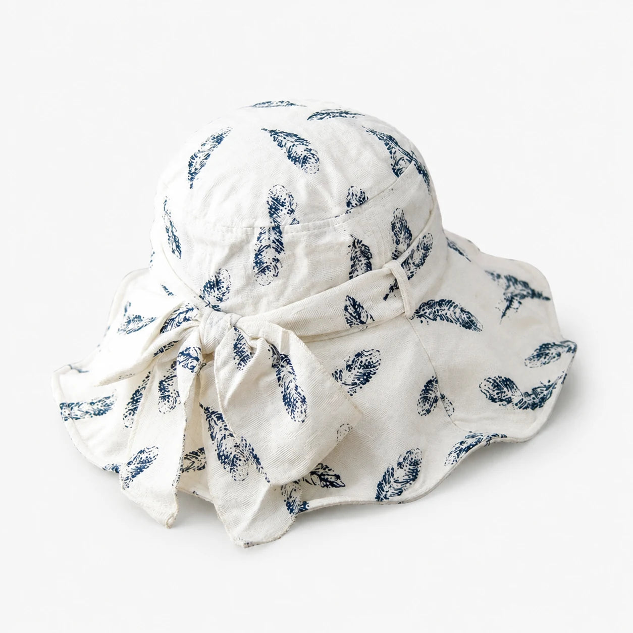 Ivory feather-print cotton-linen bucket hat with bow
