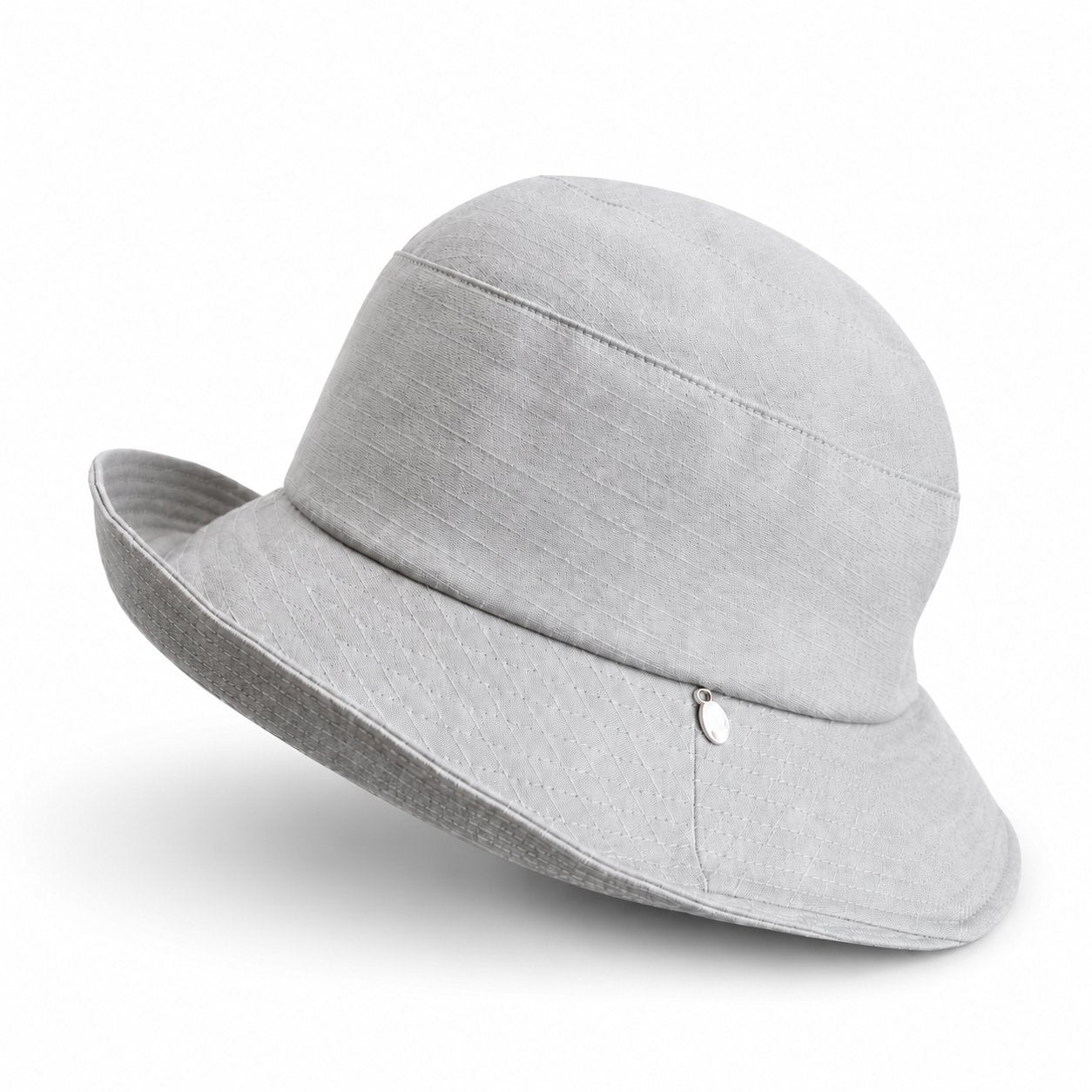 Light beige cotton bucket sun hat, angled view