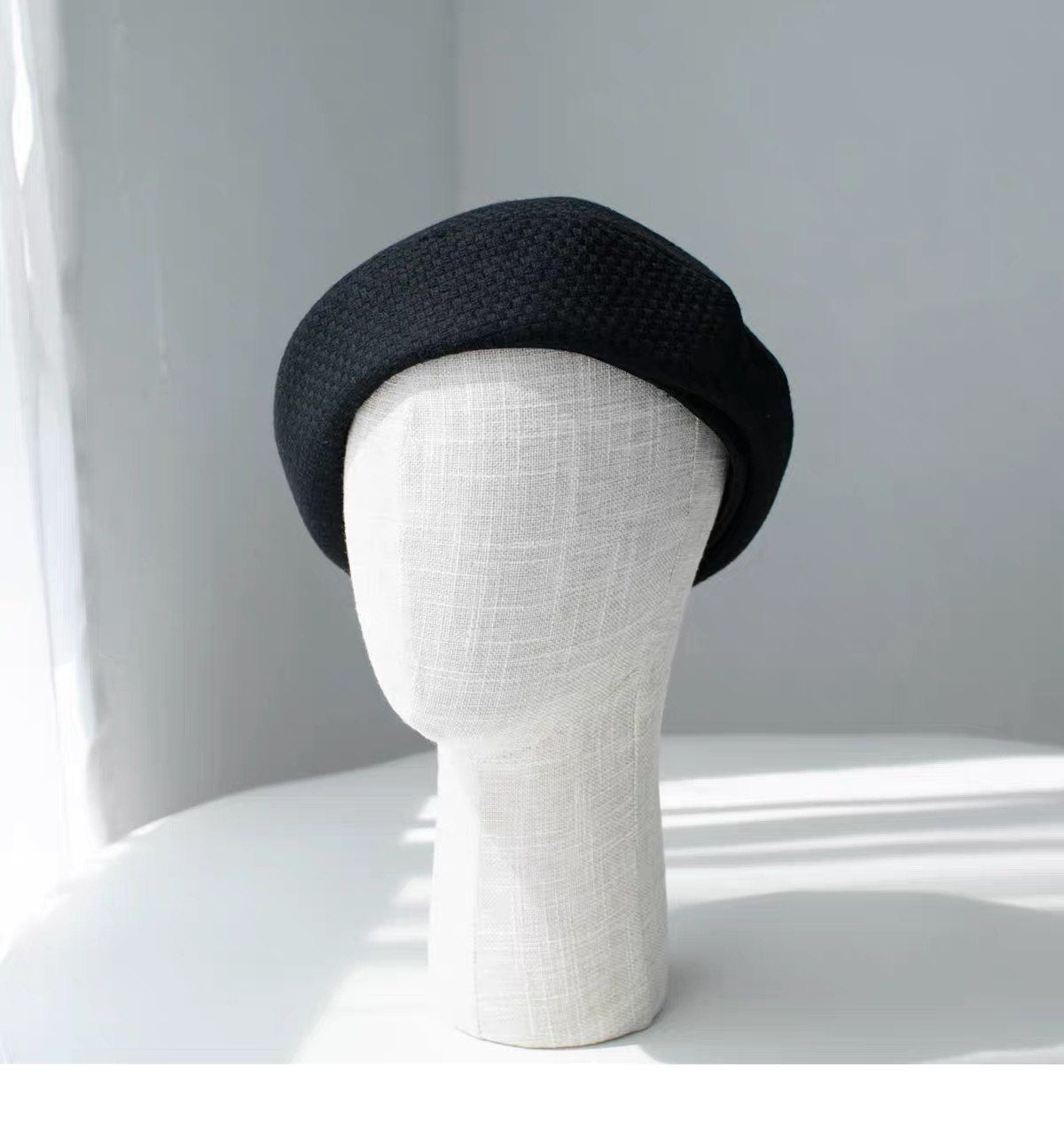 Black structured wool beret shown from the front