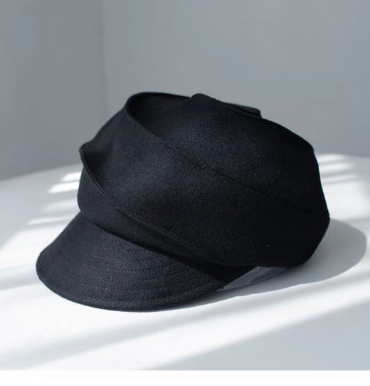 Black sculpted wool newsboy cap, three-quarter product view