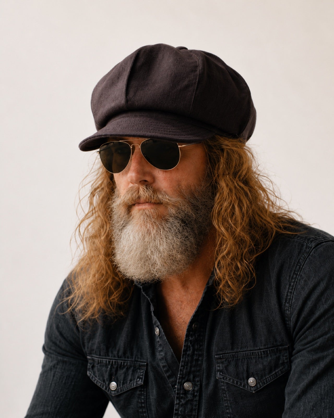 Man wearing chocolate linen newsboy baker boy cap