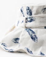 Close-up of ivory feather-print cotton-linen fabric