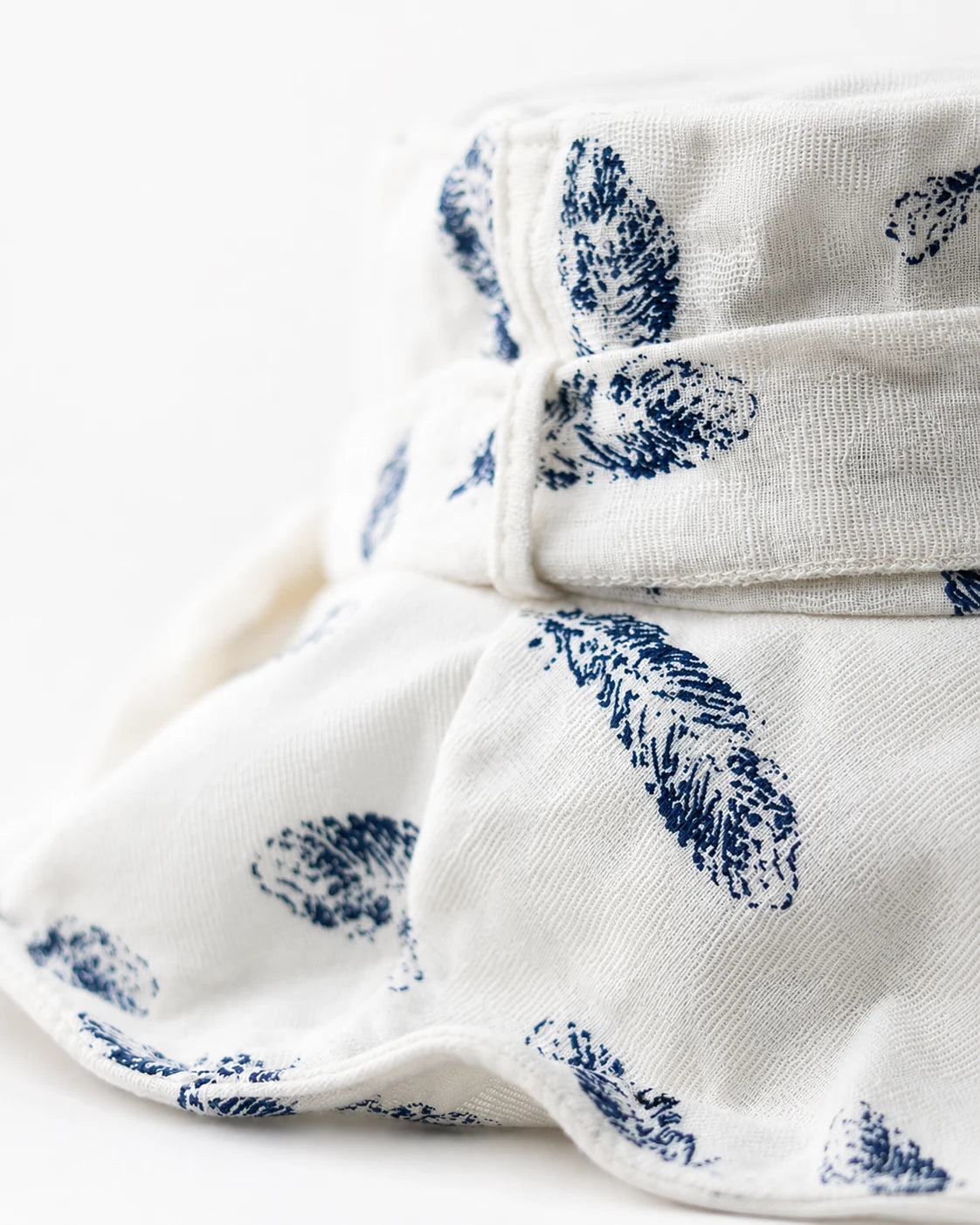 Close-up of ivory feather-print cotton-linen fabric