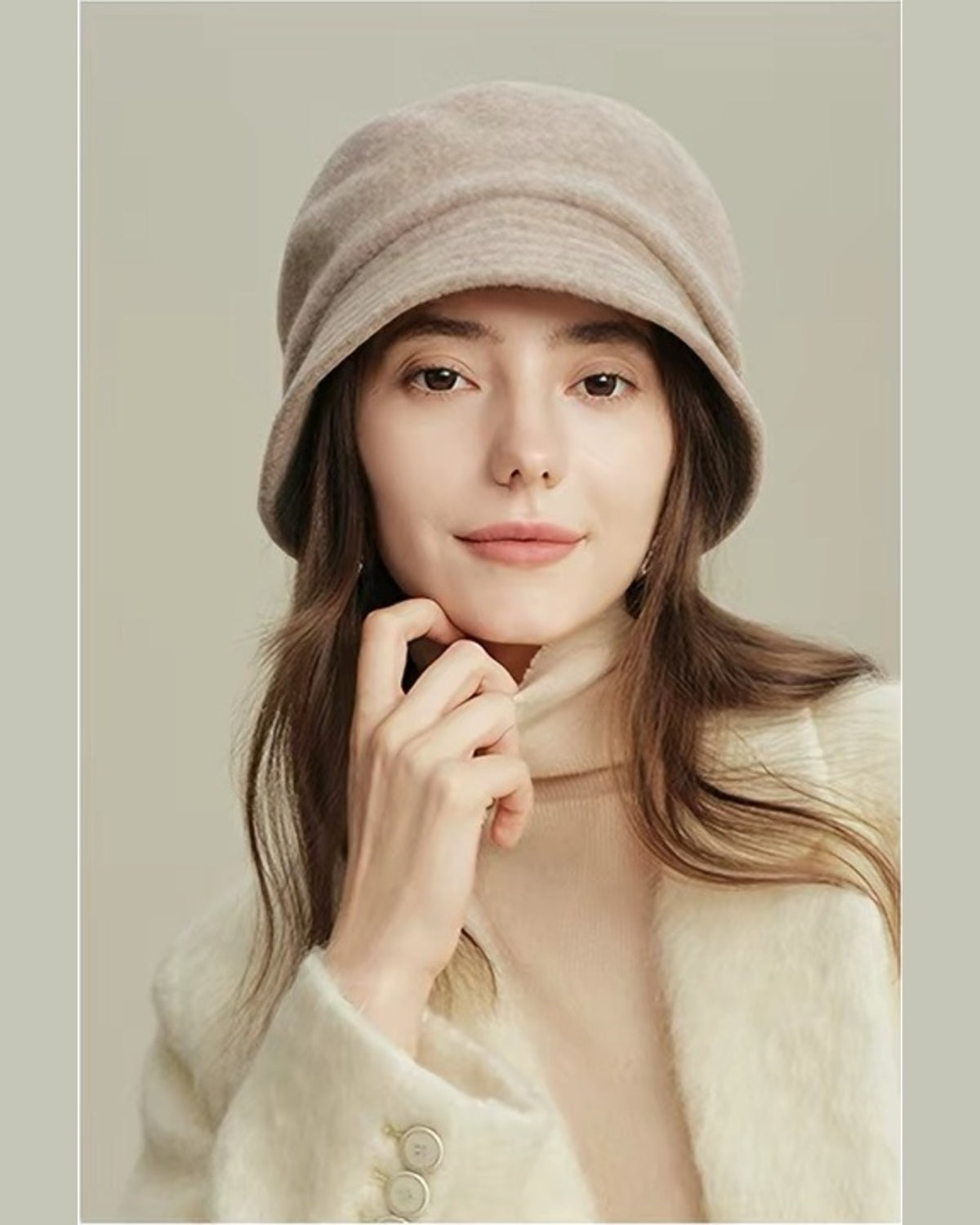 Beige wool cloche hat shown from the front on a female model