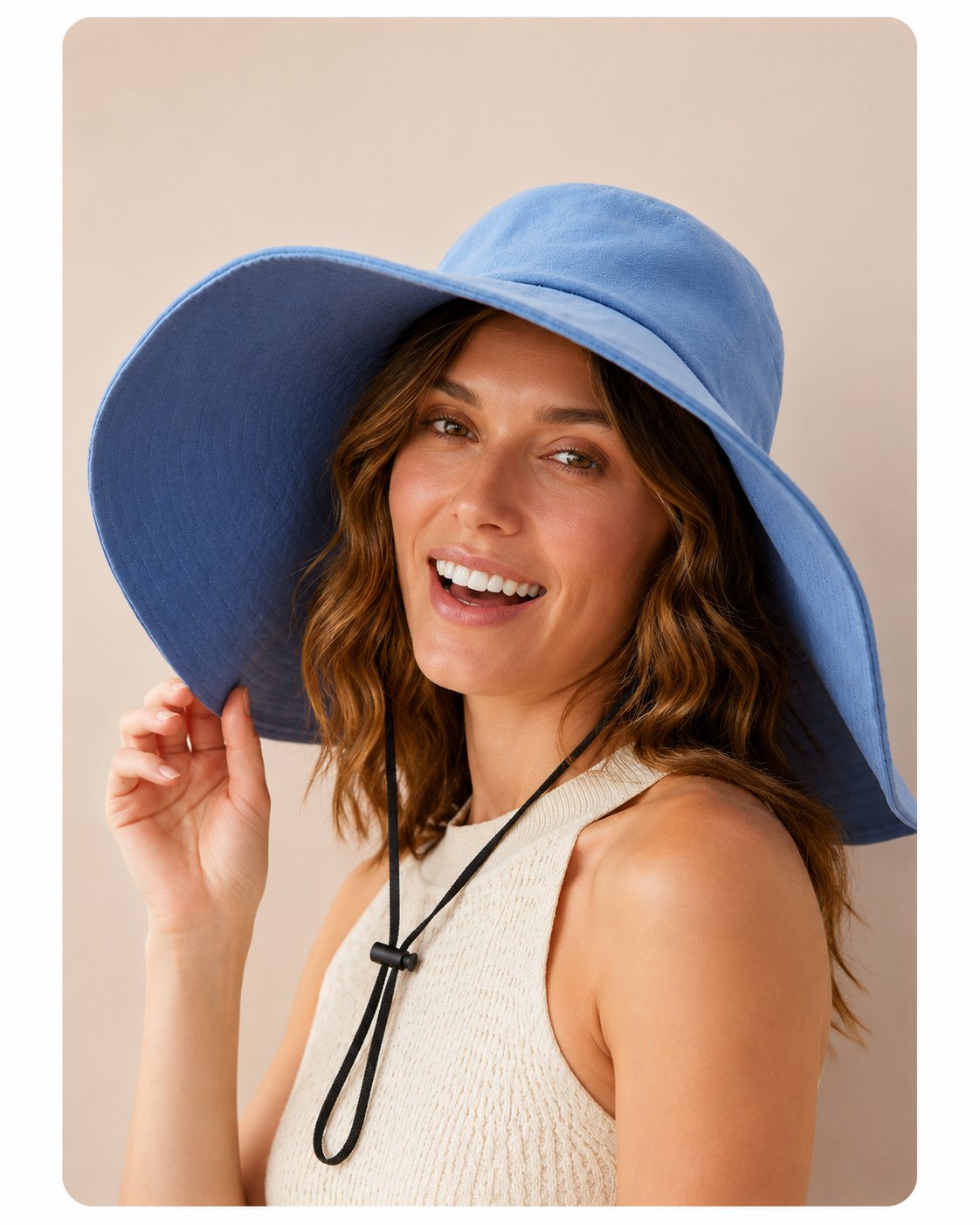 Woman wearing oversized blue wide-brim cotton sun hat