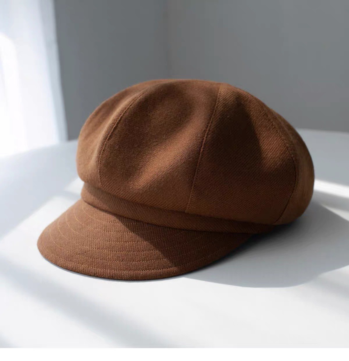 Brown fine woven wool newsboy cap, three-quarter product view