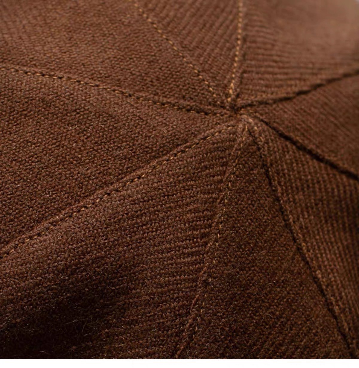 Close view of the brown fine woven wool seams and texture