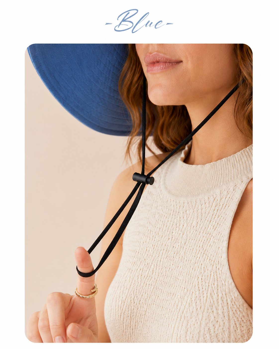 Blue oversized sun hat shading face, side view