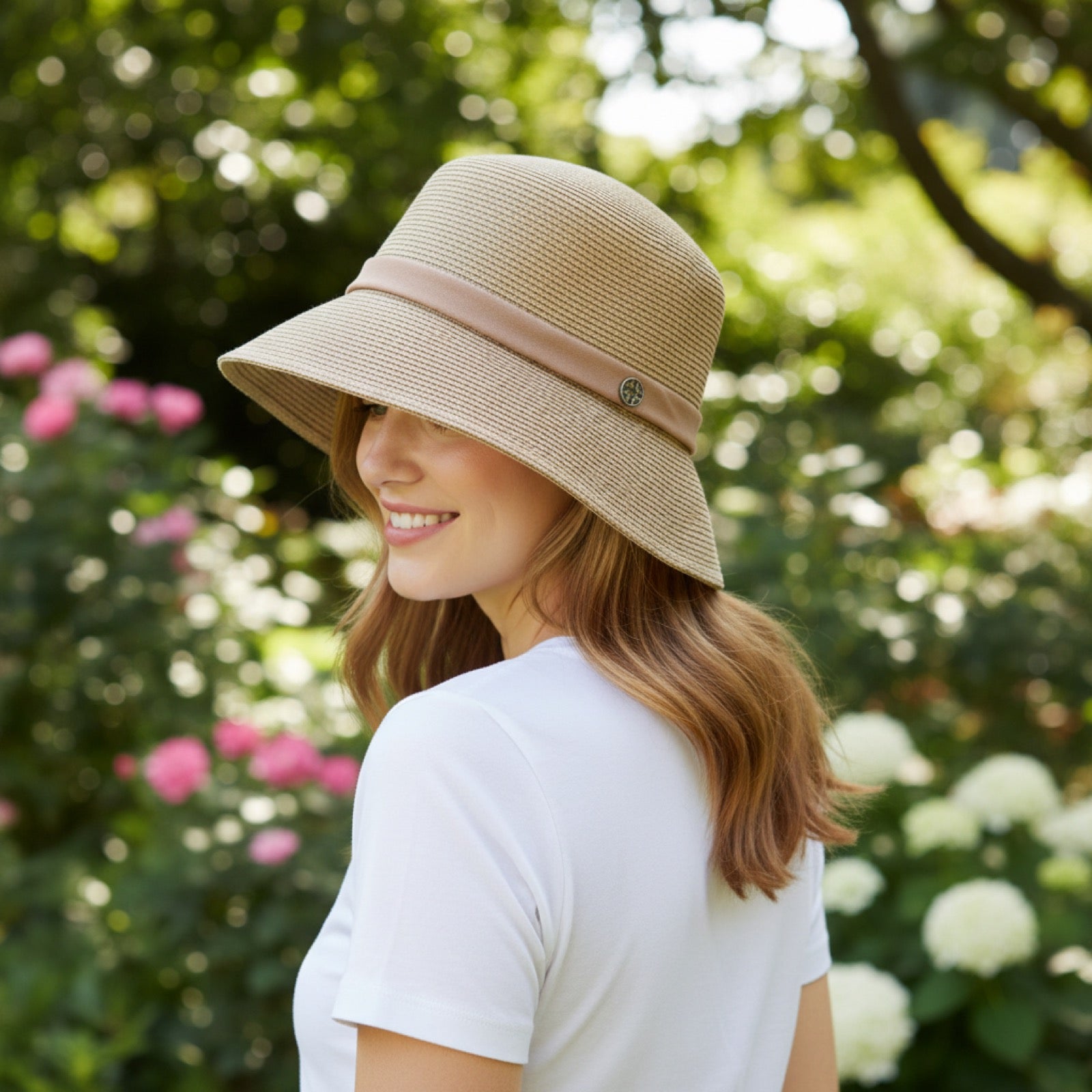Woman wearing Straw Bucket Hat with Linen Band, back view in garden
