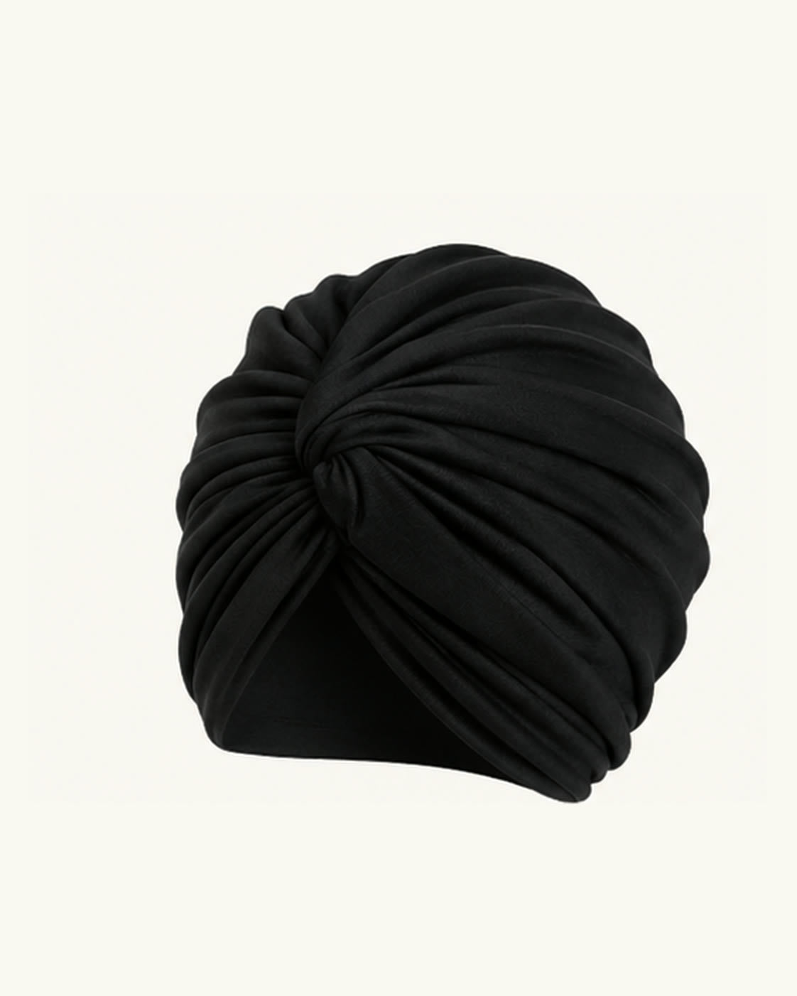 Black modal cotton knot turban head wrap on an off-white background