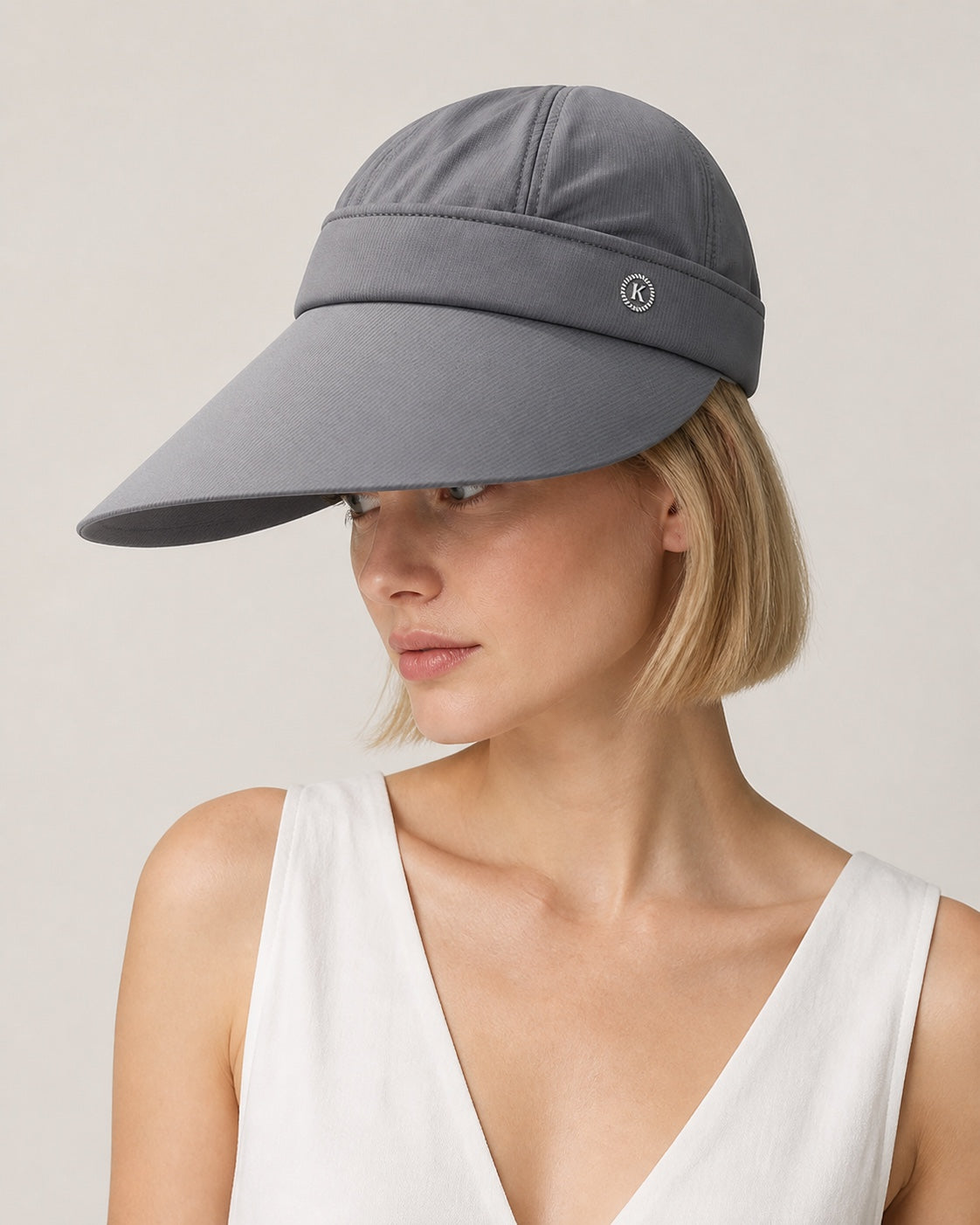 Dark gray 2-in-1 wide brim sun hat with removable top for women, shown on a studio model