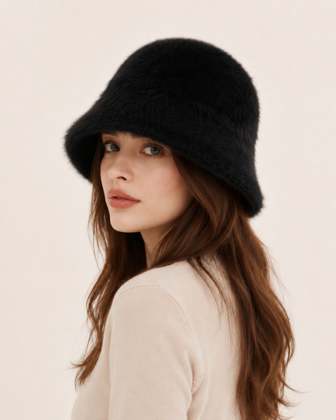 Classic black rabbit-hair blend bucket hat on a woman, three-quarter view