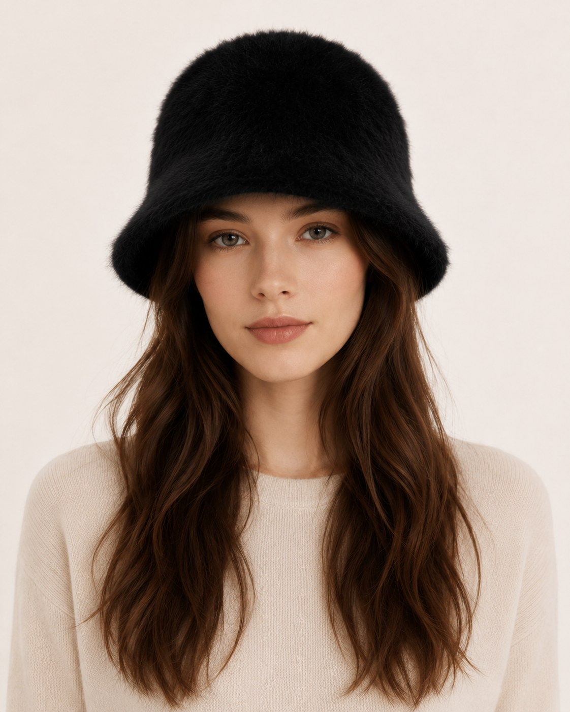 Woman wearing a classic black satin-lined rabbit-hair blend bucket hat, front view