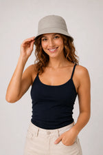 Woman wearing military green cotton bucket hat, front view
