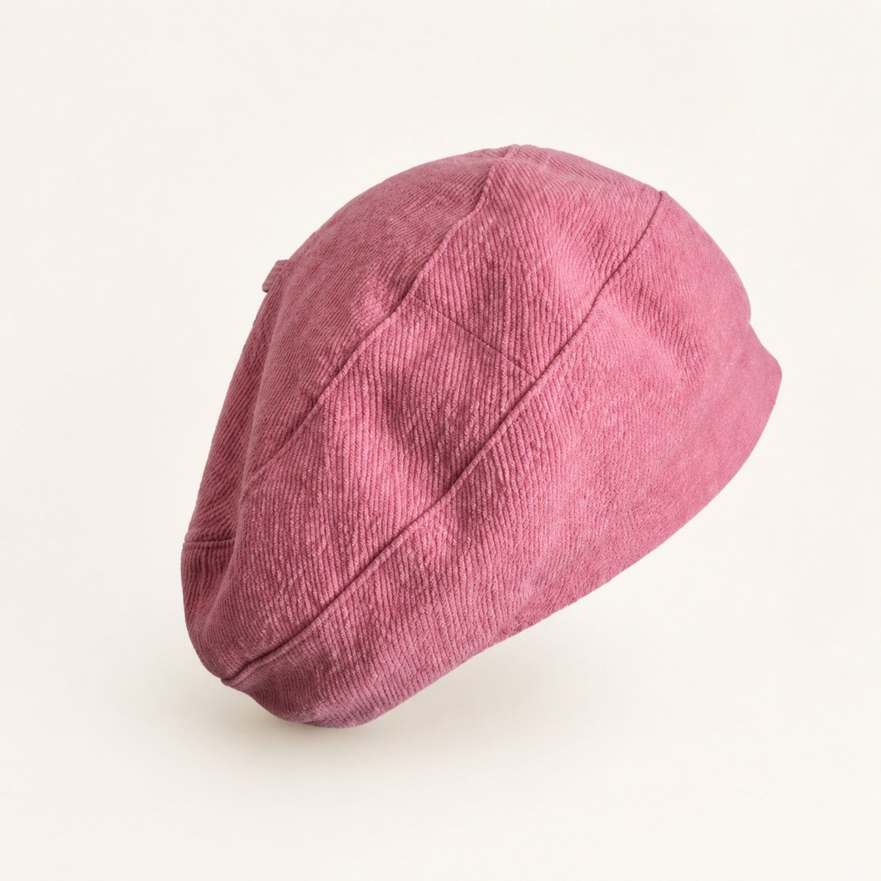 Woman wearing pink cotton linen French beret