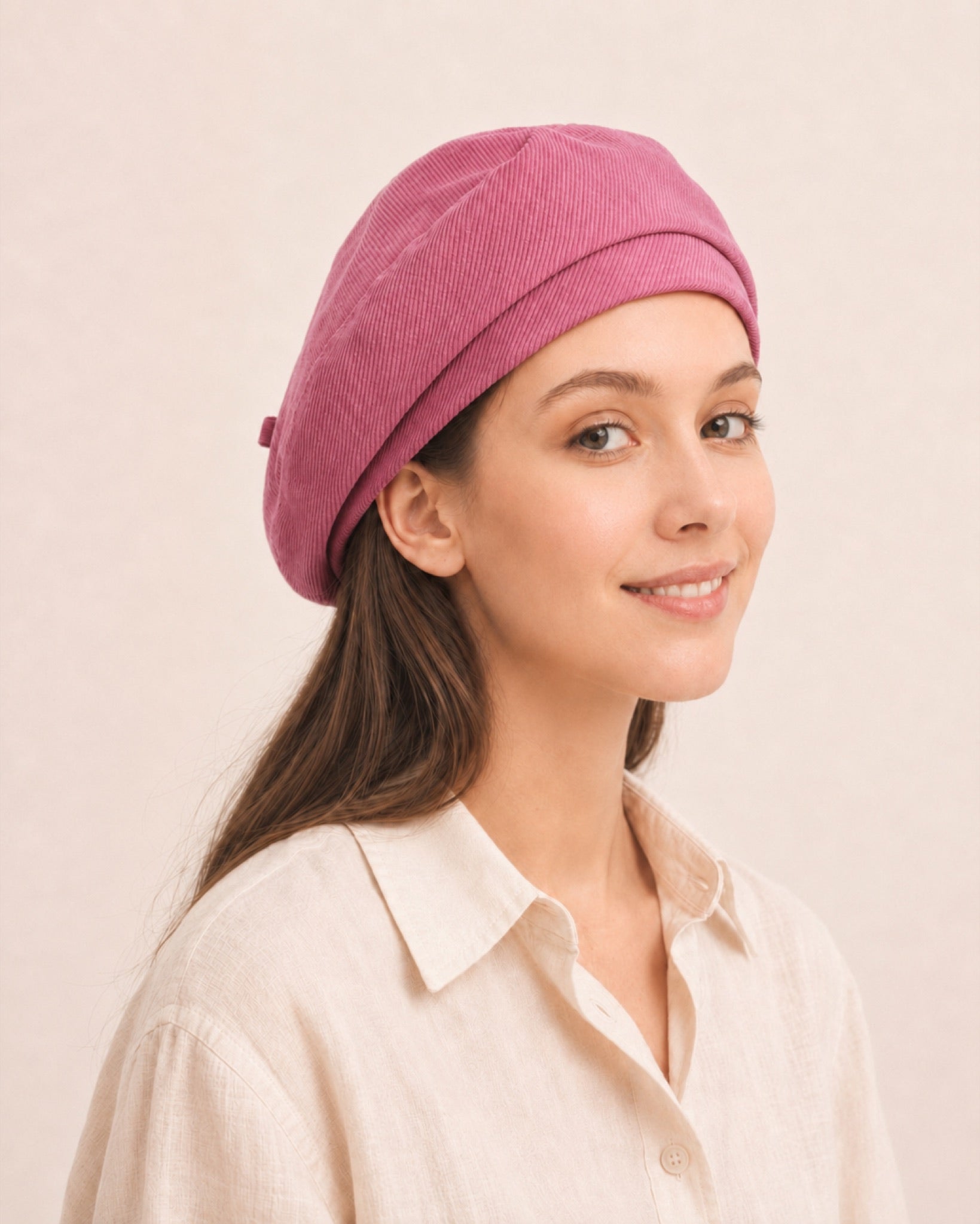 Woman wearing pink cotton linen French beret