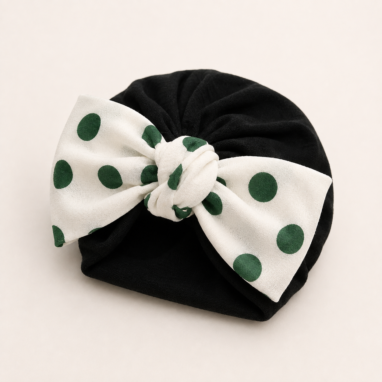 Dark modal cotton turban hair wrap with a green polka dot bow