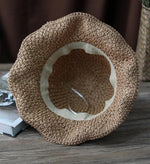 Interior view of straw hat showing inner band and construction