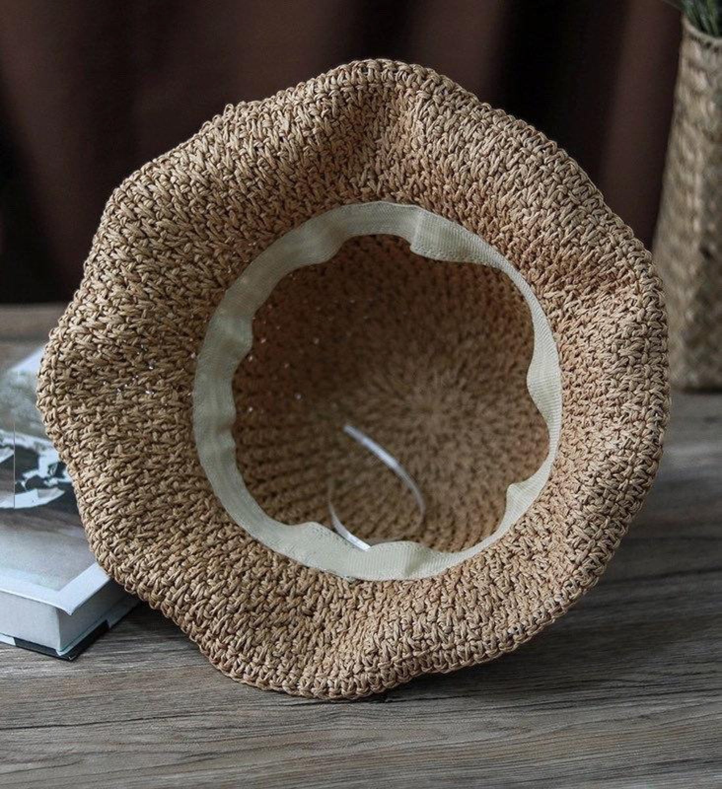 Interior view of straw hat showing inner band and construction