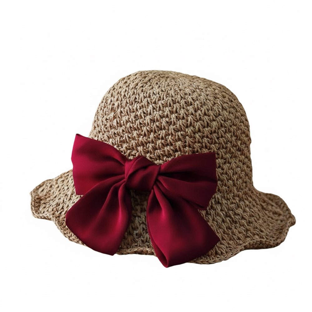 Women's camel straw sun hat with red bow, white background