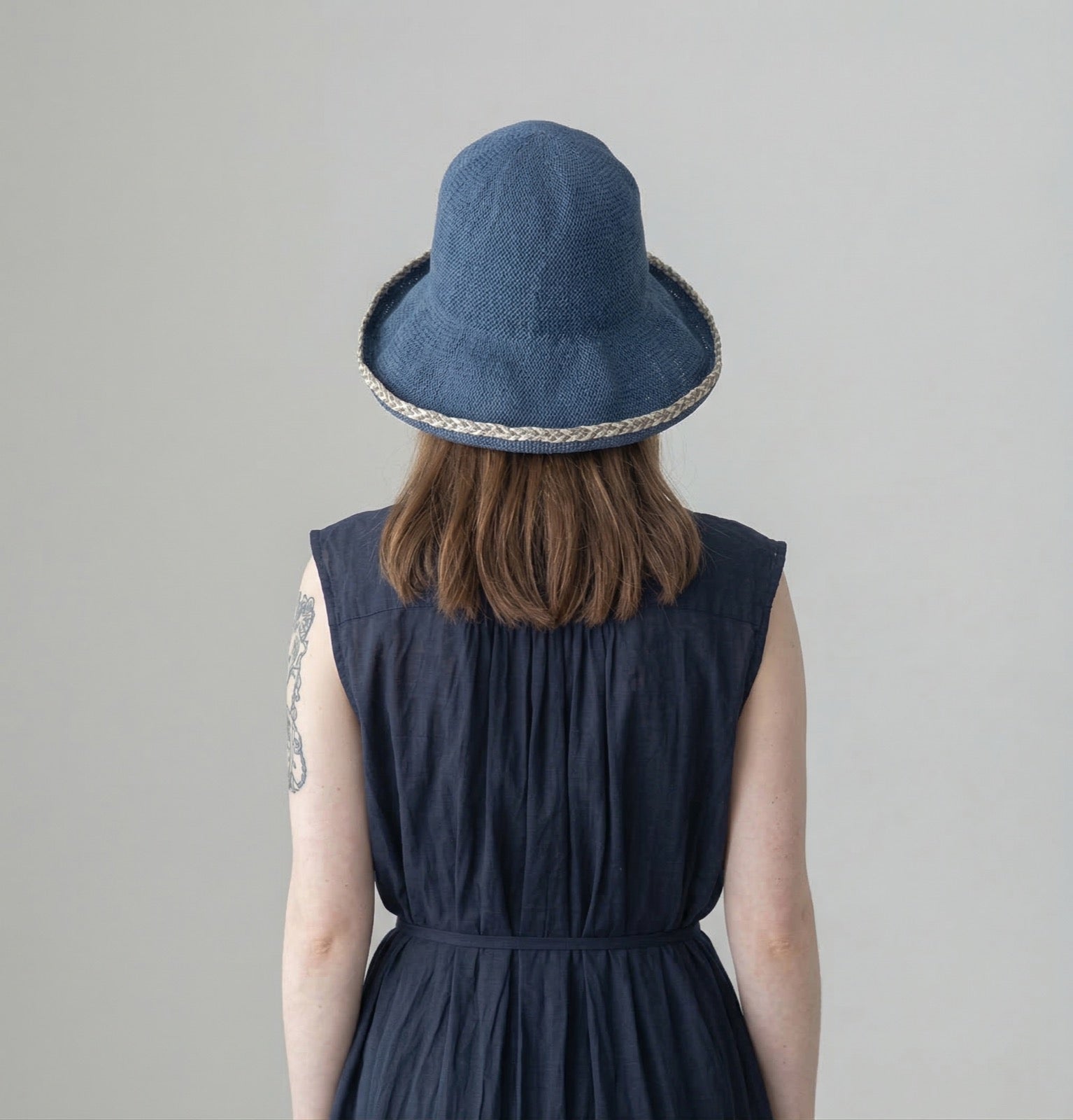 Embroidered Brim Straw Hat - Model Wearing Back View