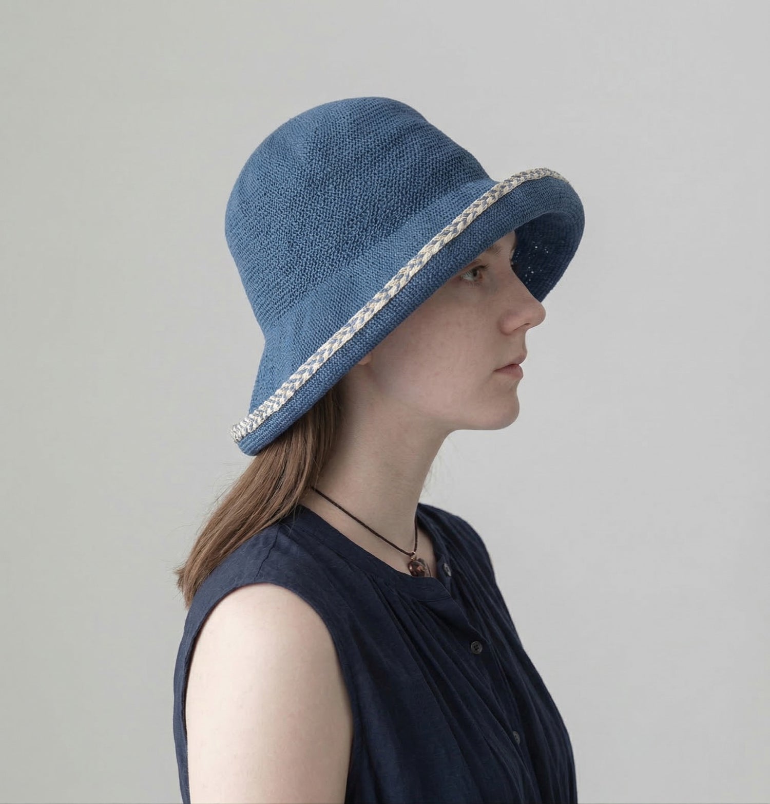 Embroidered Brim Straw Hat - Model Wearing Side Profile