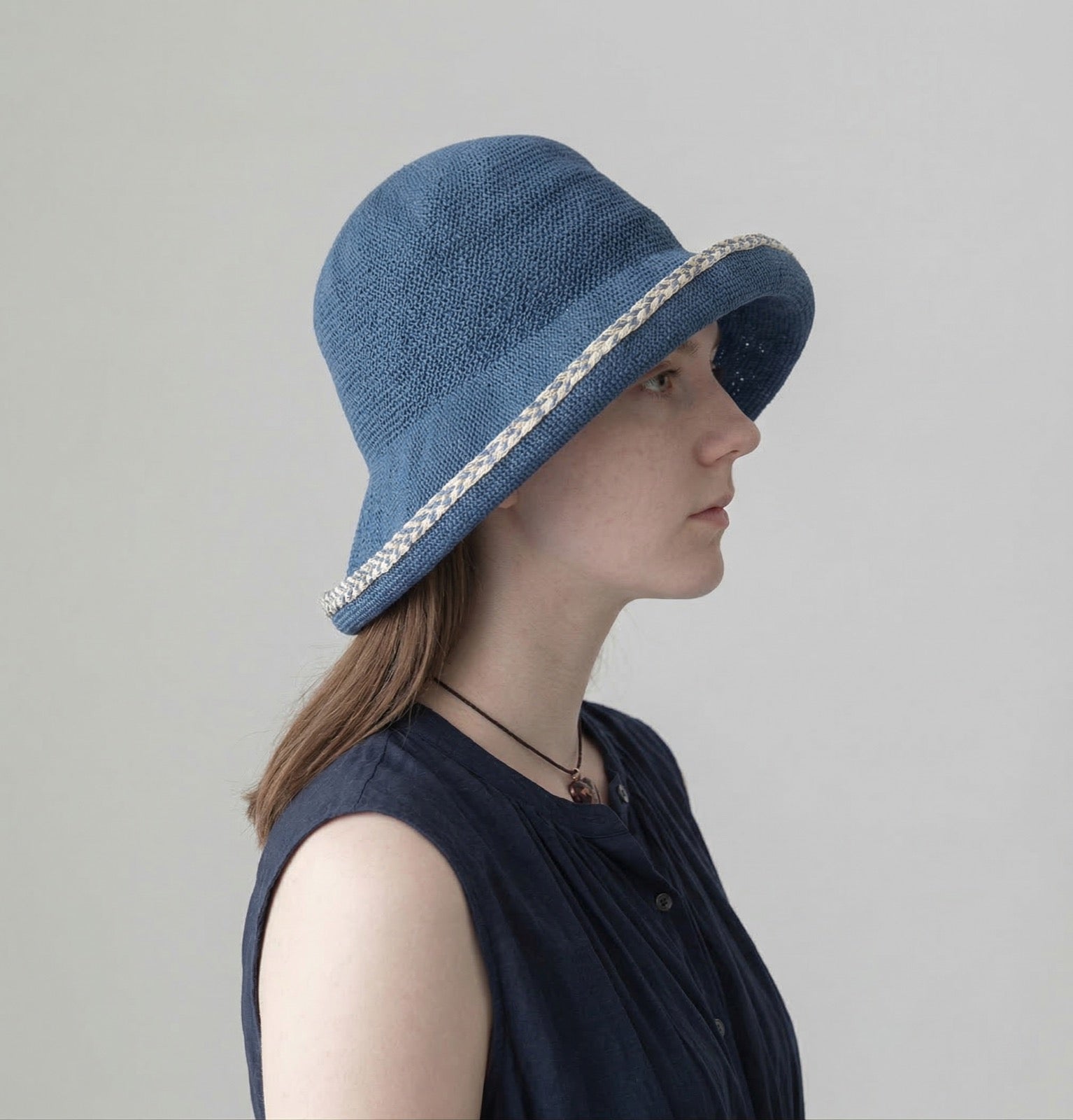 Embroidered Brim Straw Hat - Model Wearing Side Profile