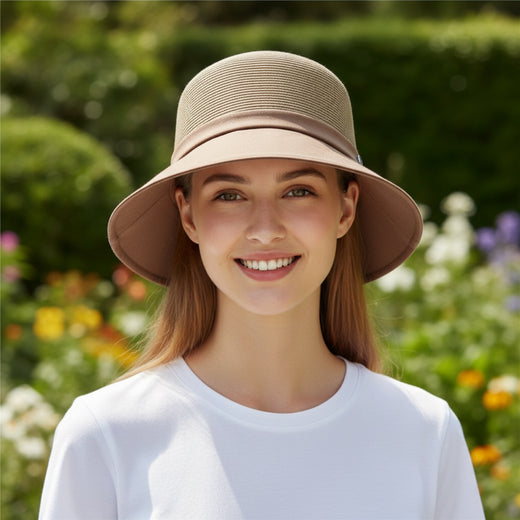 Woman wearing Straw Bucket Hat with Linen Band, front view in garden