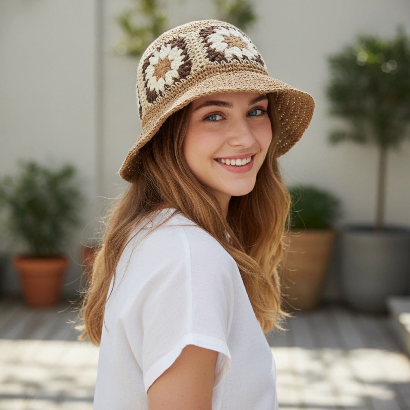 Woman wearing Flower Decorated Straw Bucket Hat three-quarter view
