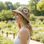 Woman wearing Flower Decorated Straw Bucket Hat side view