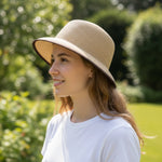 Woman wearing Foldable Natural Straw Sun Hat side view