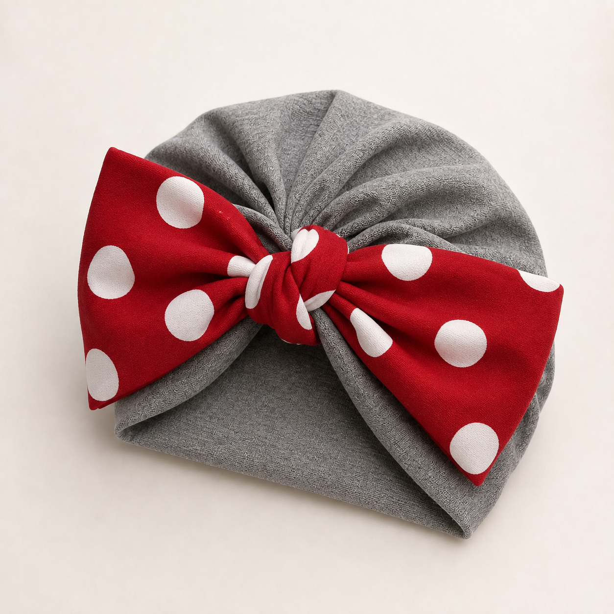 Grey modal cotton turban hair wrap with a red polka dot bow