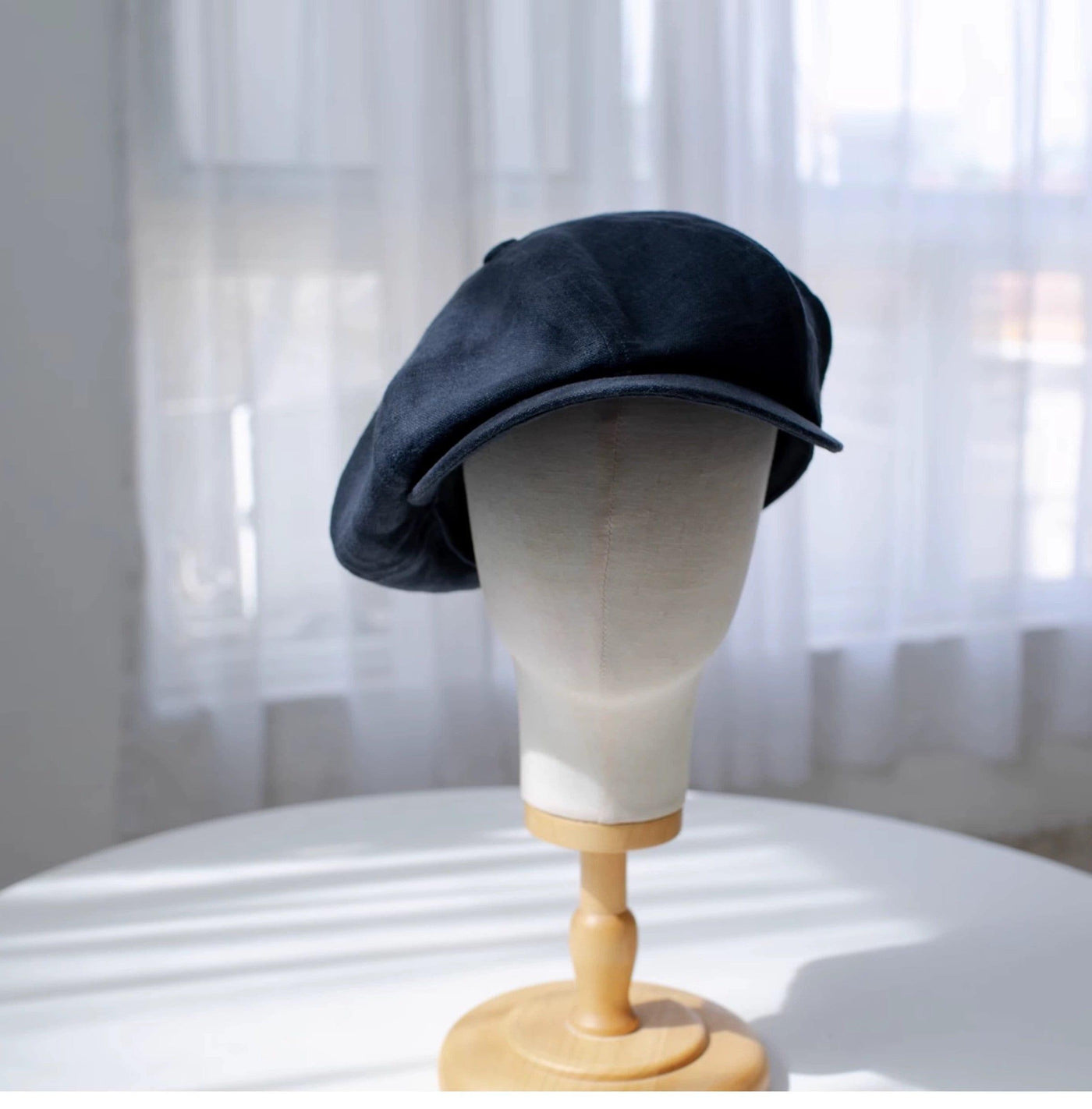 Black Linen Newsboy Cap Front View on Stand - Mspineapplecrafts