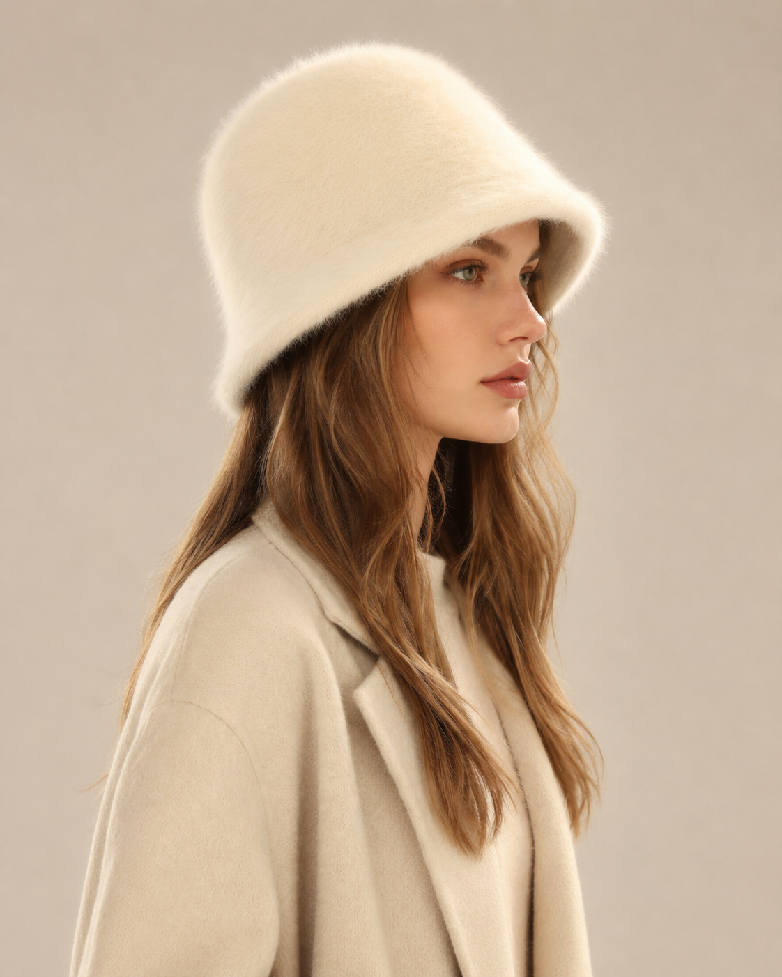 Ivory cream rabbit-hair blend bucket hat on a woman, side profile