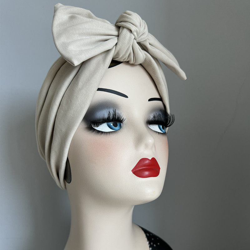 Khaki modal cotton turban hair wrap with a matching khaki bow