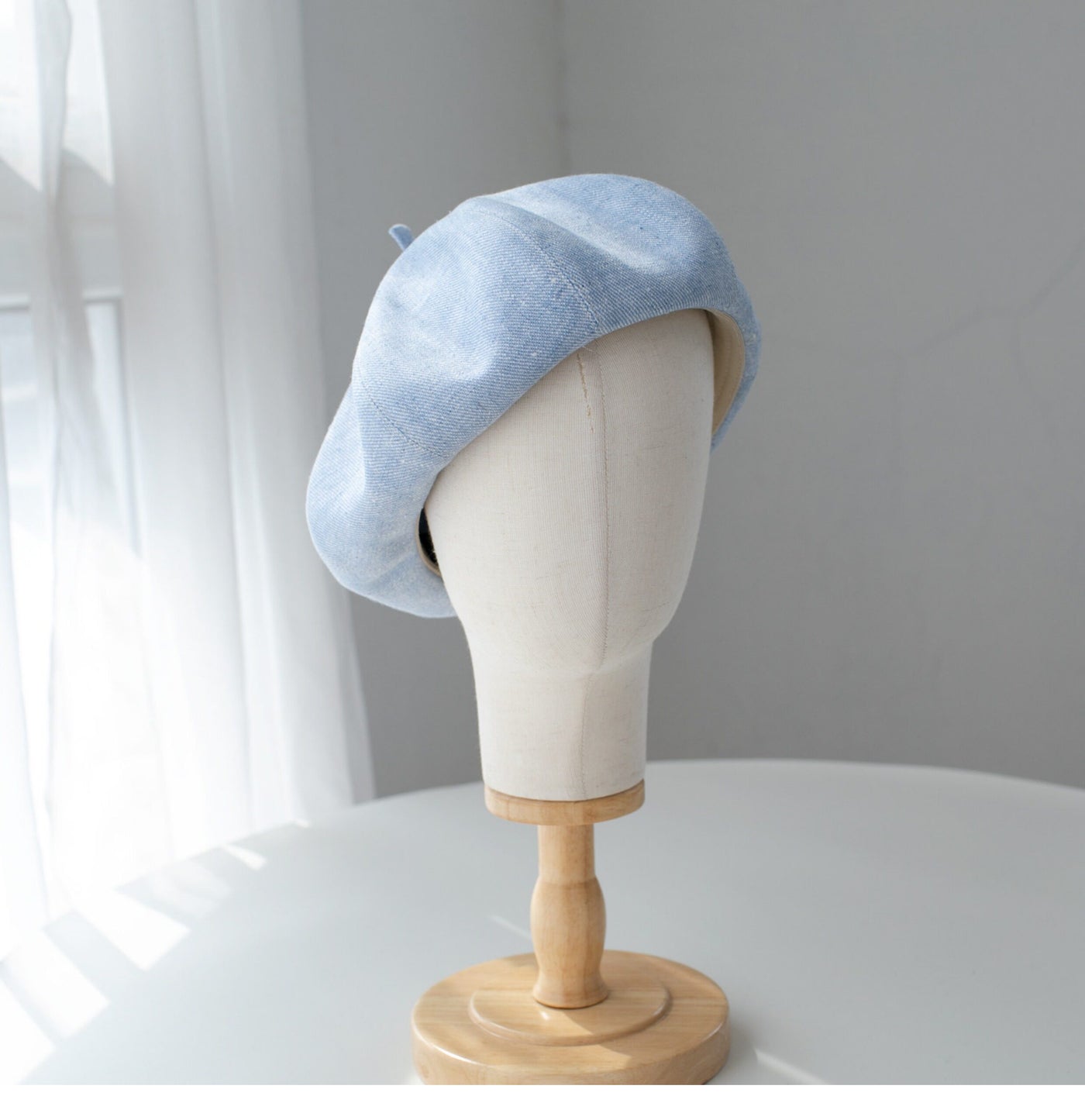 Light blue linen beret detail