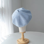 Light blue linen beret detail