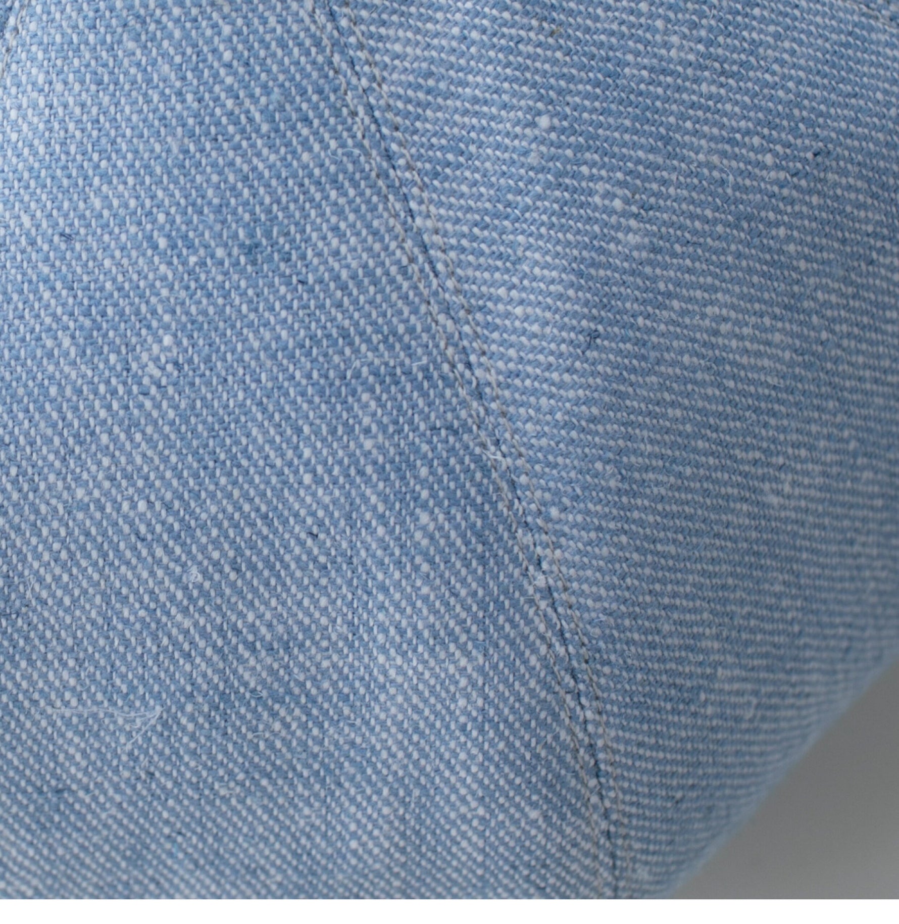 Light blue linen beret fabric texture close-up