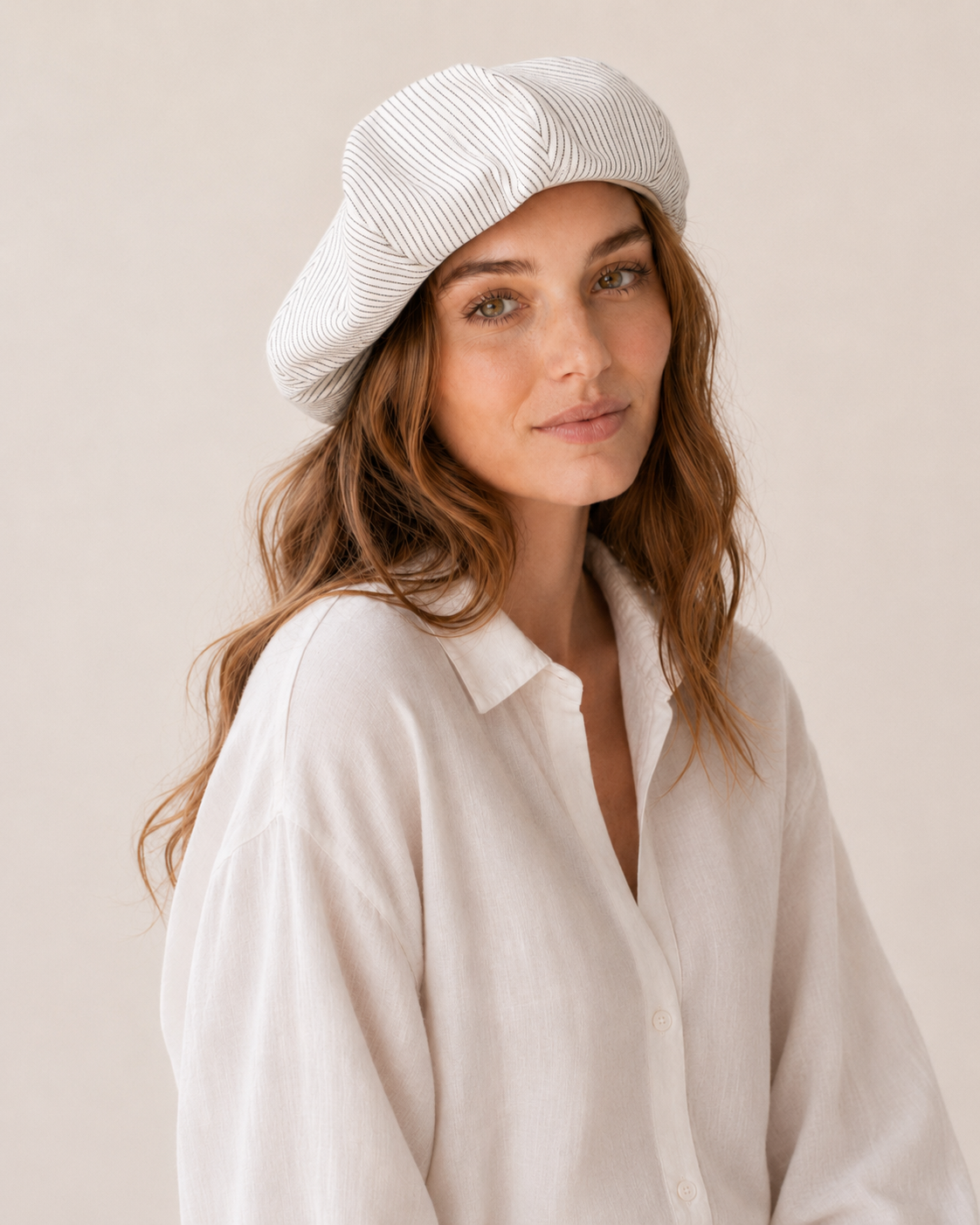 Woman wearing oversized linen French beret – Black & White Stripe