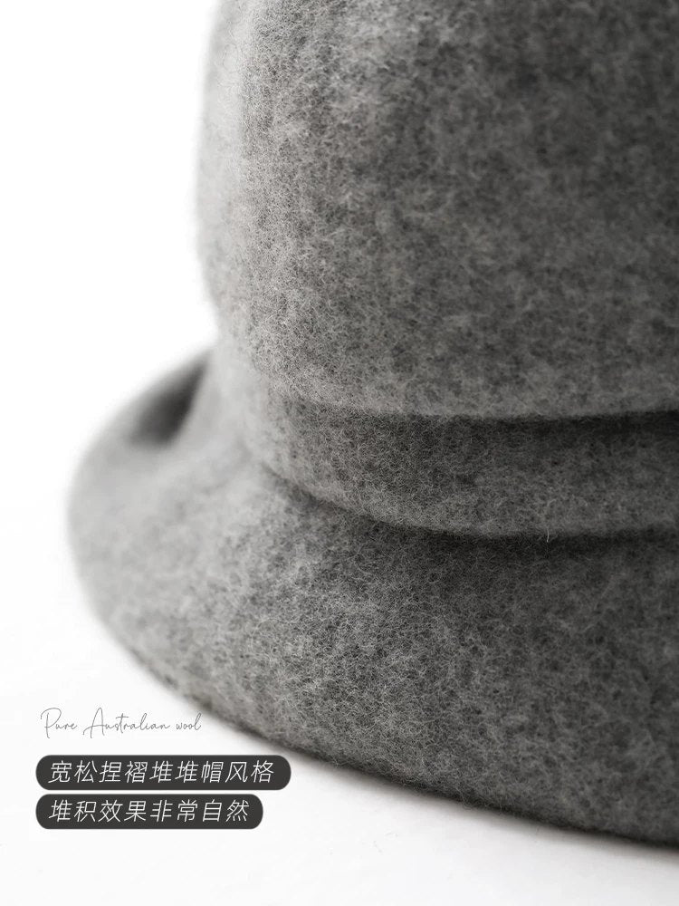 100% wool slouchy beret with short brim styling